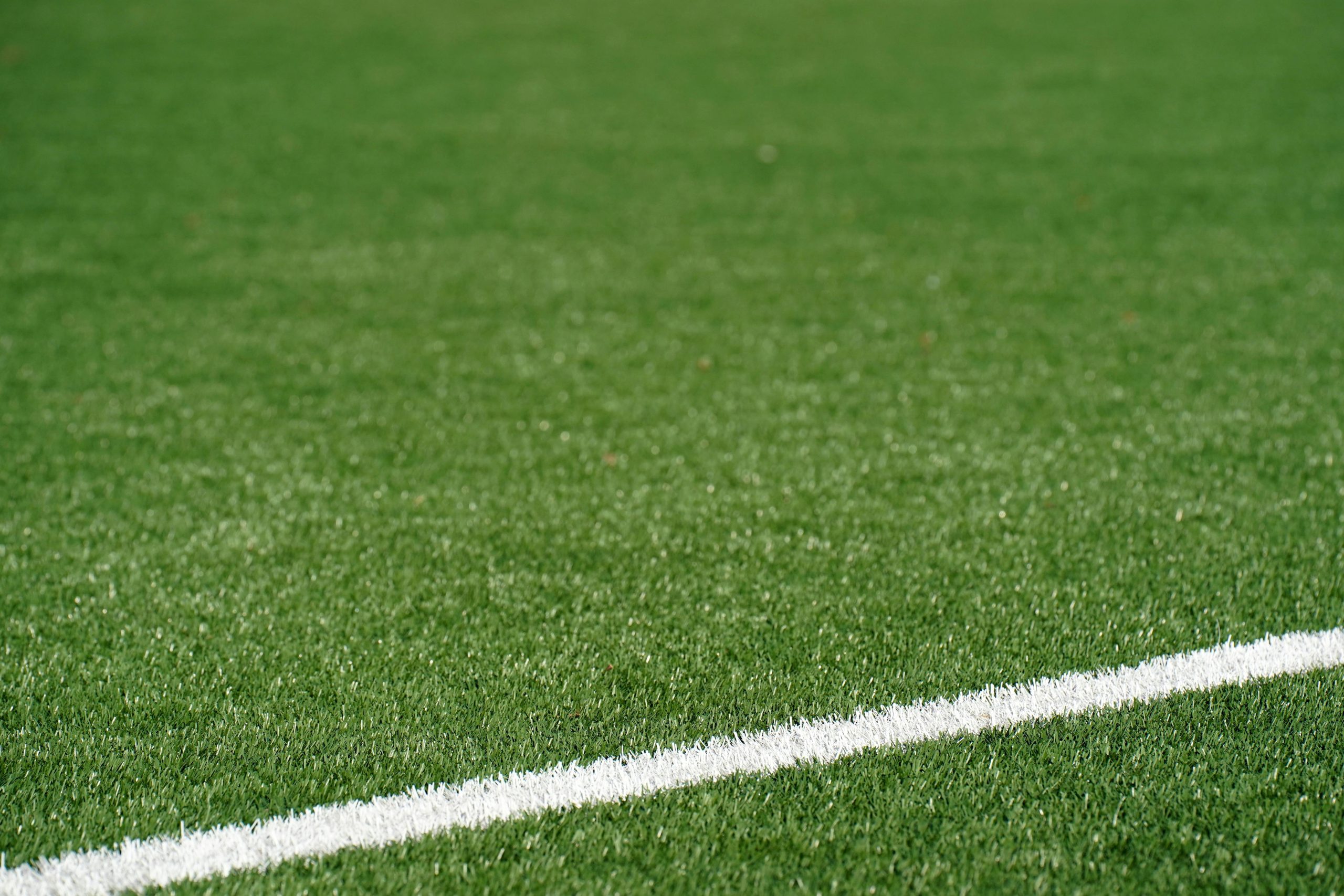 Football sur gazon ou synthétique